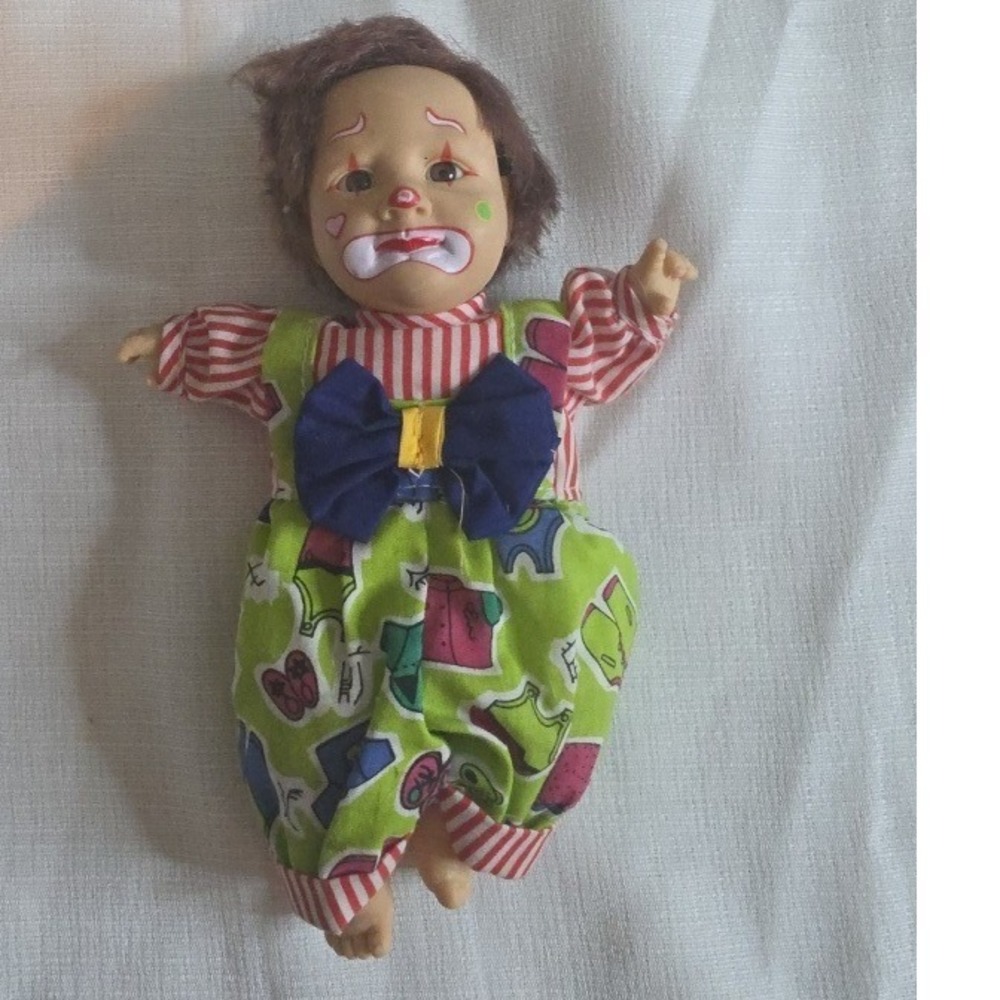 Vintage Sad Clown Baby Doll Green Romper Red Striped Sleeves Blue Bow Tie